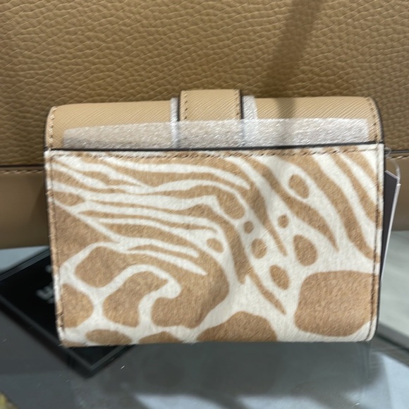 MICHAEL KORS
Carmen Medium Flap Bifold Faux Fur-Leather Wallet
Camel 
NWT - Picture 4 of 16
